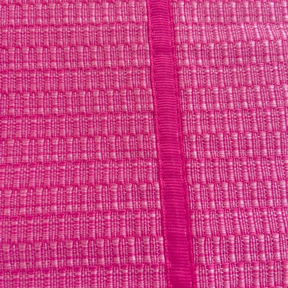 Set of four pink placemats with pink ribbon